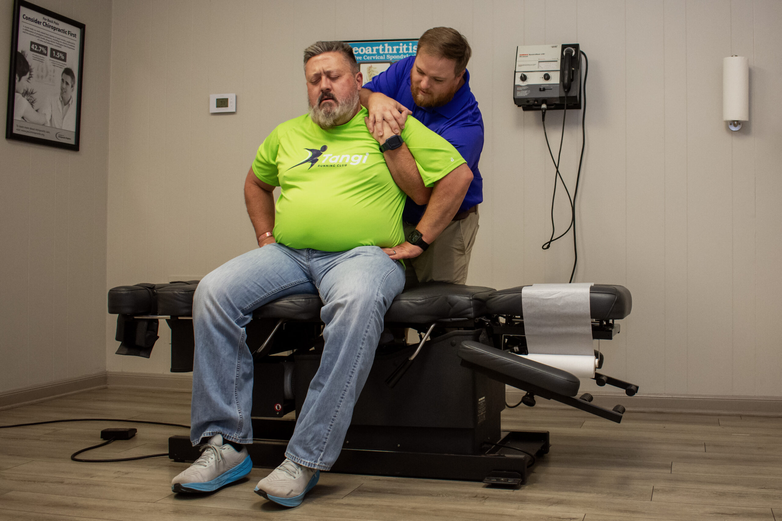 Man receiving chiropractic treatment from Dr. Samuel Catalanatto.
