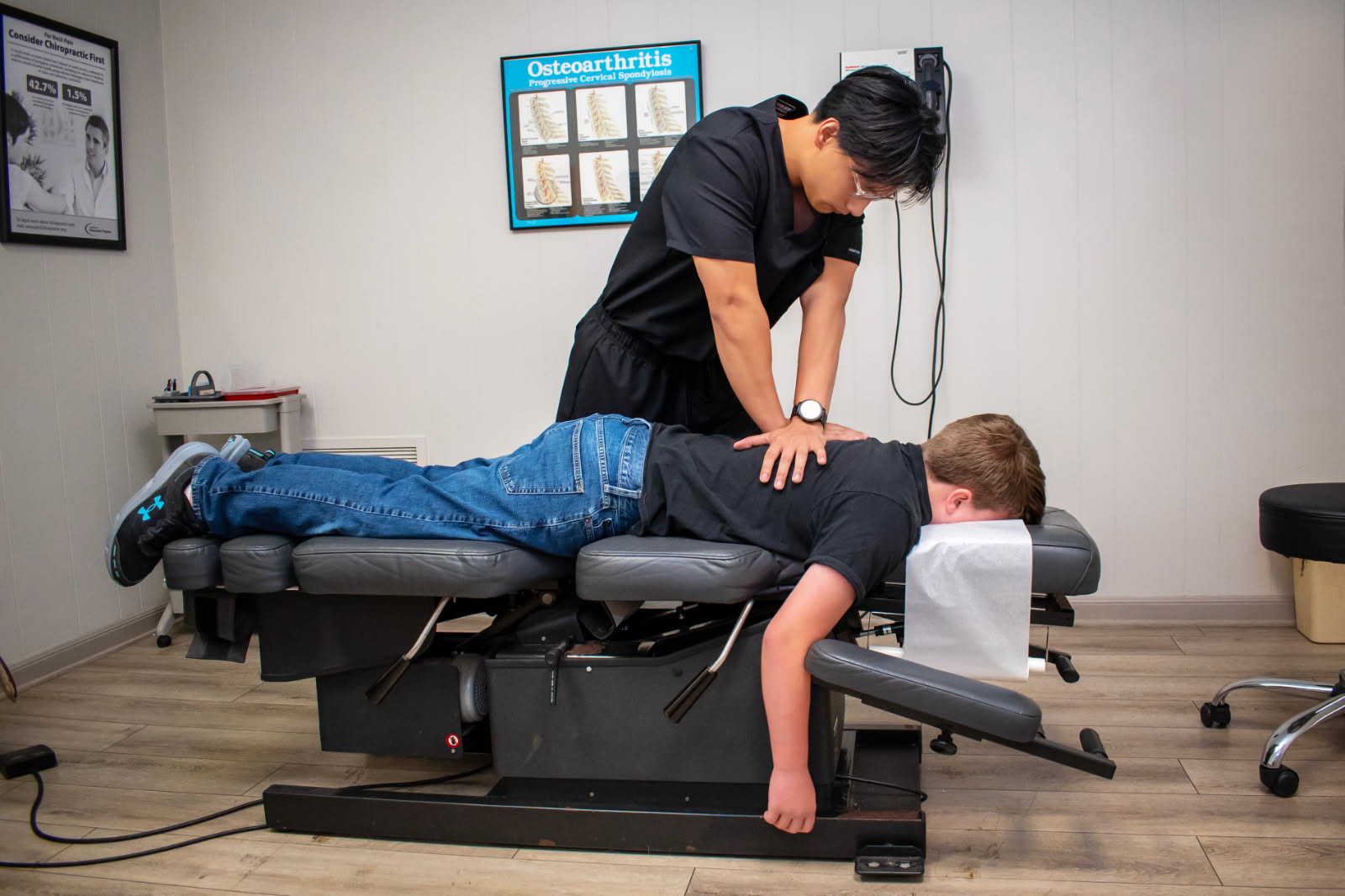 Man receiving chiropractic treatment from Dr. Samuel Catalanatto.